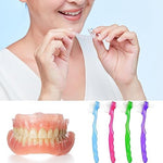 Geodurn oral hygiene cleaning brush being held to demonstrate the comfortable ergonomic design.