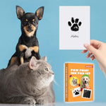 Clean touch ink pad being pressed by a dog paw to create an impression