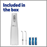 ADA Accepted Waterpik white portable flosser with two replacement tips