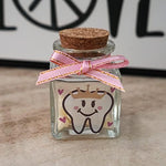 Close up of pink bow detail on Hamuiers tooth box