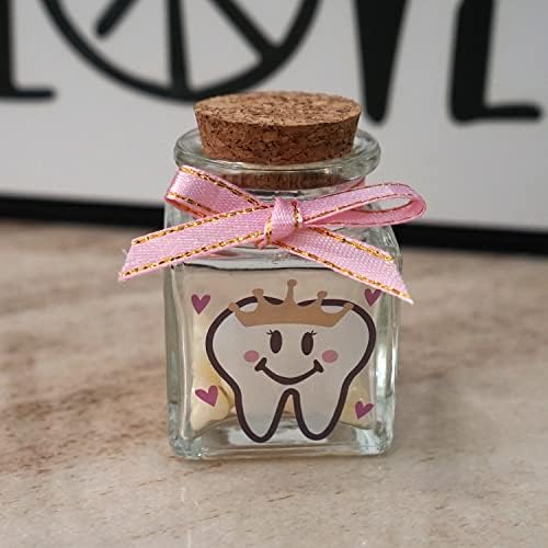 Close up of pink bow detail on Hamuiers tooth box