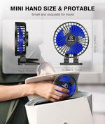 JZCreater lightweight travel desk fan placed on a bedside table next to a sleeping area