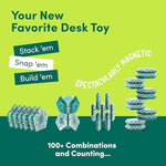 Speks Geode aqua magnetic pieces self aligning into an architectural tower shape.