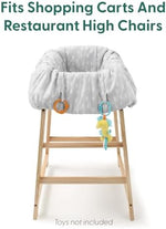 Adjustable safety strap and toy loops on the neutral grey toddler cart cover