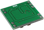HiLetgo miniature class d power amp board with five volt input pin connections visible