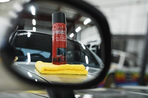 No drip aerosol glass cleaner removing grime from side mirrors