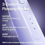 Portable AquaSonic water flosser showing three cleaning mode buttons