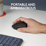 Logitech optical tracking mouse bottom view displaying the power switch and battery compartment lid