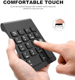 Underneath view of the TRELC portable number pad showing the four anti slip rubber mats