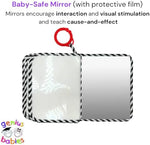 Genius Baby Toys infant development book highlighting the final page with the baby safe mirror.