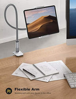 Close up of the adjustable bracket holding a mobile phone in landscape mode