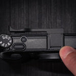 Underside view highlighting the integrated protective silicone pad designed to block dust and moisture.