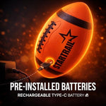Impact activated ultra bright football glowing on a beach during evening games