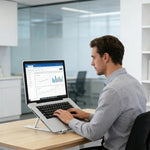 White portable tablet and laptop bracket fully expanded on an office table