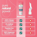 Close up of Wellnesse kids toothpaste packaging showing vegan and non-toxic labels.