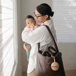 Premium food grade silicone material detail of the Mushie non toxic pacifier storage pouch