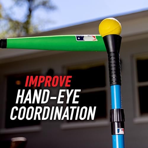 Youth athlete practicing swing with Franklin Sports training tee