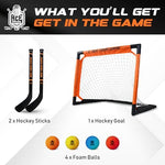 ACE HOCKEY complete two player mini hockey kit with soft foam balls displayed on the floor.