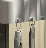 Weber stainless steel barbecue utensils laid out flat