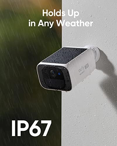 Eufy smart surveillance camera angled upwards to capture direct sunlight on its top-mounted solar charging panel.