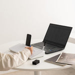 Garood dry erase board positioned over keyboard space on office desk