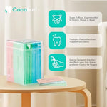 Adult using the two in one dental toothpick end of the COCOBURI flosser for interdental cleaning