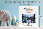 Jwitao first time mom milestone frame set up as a tabletop pregnancy announcement photo prop.