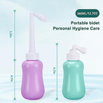 Portable bidet for perineal recovery showing retractable spout feature.