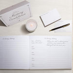 Revery funeral guest book with metallic pen and table sign