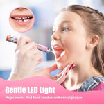 Dada-Tech battery operated toothbrush with extra soft DuPont bristles.