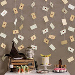 Detailed measurements of the nine by fourteen centimeter vintage letter cardstock banner