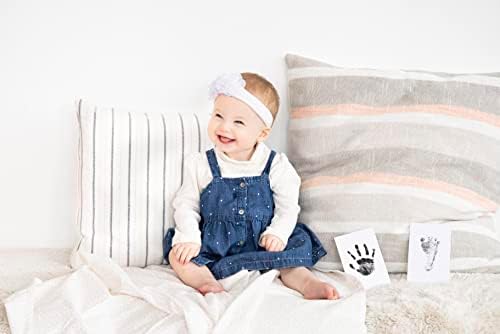 Black ink pad and two white impression cards included in the newborn keepsake set.