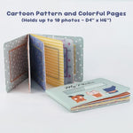 Fanna plush baby memory book opened to display internal colorful pages with clear photo pockets