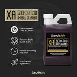 Suds Lab wheel cleaner spray bottle showing professional car detailing use