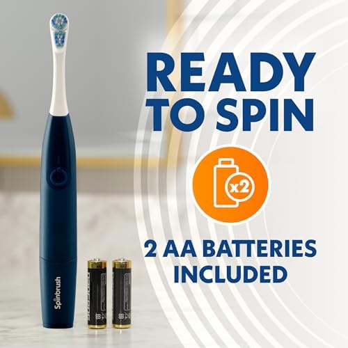 Authentic USA imported Spinbrush battery operated toothbrush kit components unboxed.