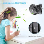 HONYIN quiet USB fan sitting flat on a modern office desk setup highlighting its compact personal cooling size.