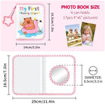 Jenlan soft cloth memory book opened displaying transparent photo sleeves and baby-safe mirror