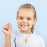 Close up of Artibetter tooth keepsake box snap lid
