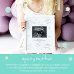 Tiny Ideas baby sonography keepsake frame hanging as elegant nursery wall decoration