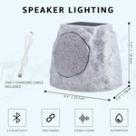 NiceBuy True Wireless Stereo rock speaker 2 pack arranged on a concrete patio deck