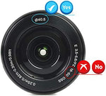 Two pack of black 40.5mm replacement camera lens caps with attached elastic keeper strings.