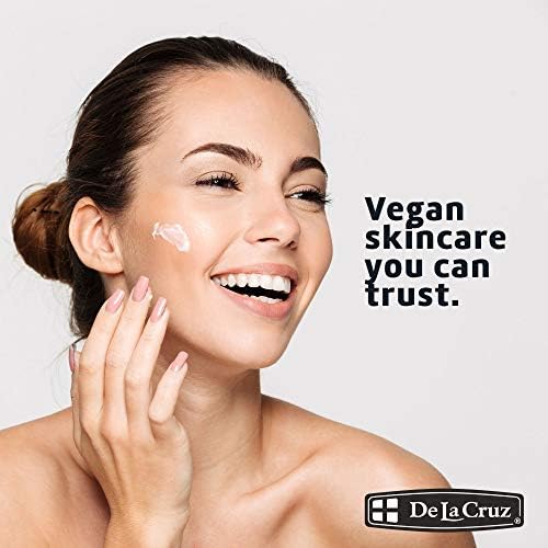 Close up of De La Cruz Vitamin E Cream text indicating anti-aging and wrinkle reduction benefits
