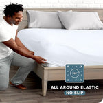 White microfiber fitted sheet on a queen bed setting