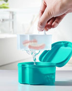 Removable strainer basket inside JMU denture soaking cup