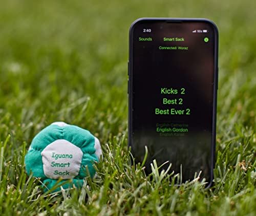 App-enabled electronic footbag displaying the internal battery installation process.