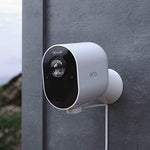 White weather resistant magnetic connector head detail on Arlo camera charging cable