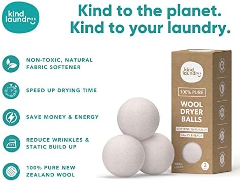 Pure New Zealand wool balls for laundry being held to show size and texture
