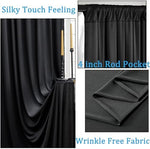 Close-up texture of the thick black polyester fabric detailing the wrinkle resistant quality
