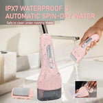 Pink electric pedicure tool showing battery percentage on digital screen