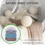 Extra large white natural fabric softener dryer balls separating wet clothes